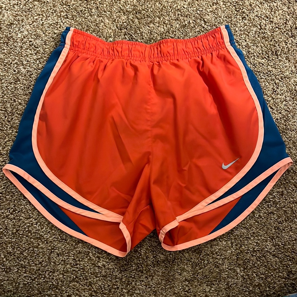 Neon nike running shorts.